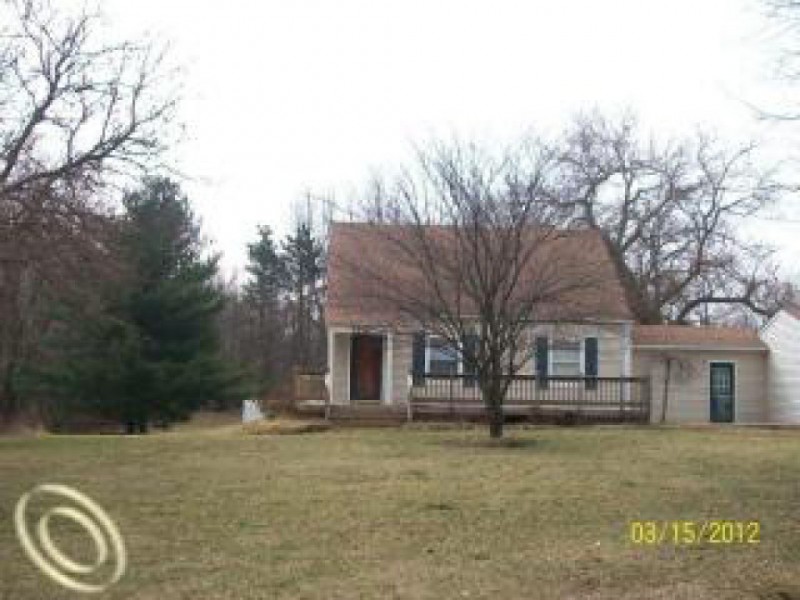 House Hunt Colonial Home Featuring Wide Front Porch Hartland, MI Patch