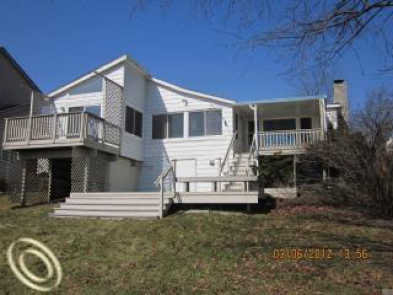 House Hunt Colonial Home Featuring Wide Front Porch Hartland, MI Patch
