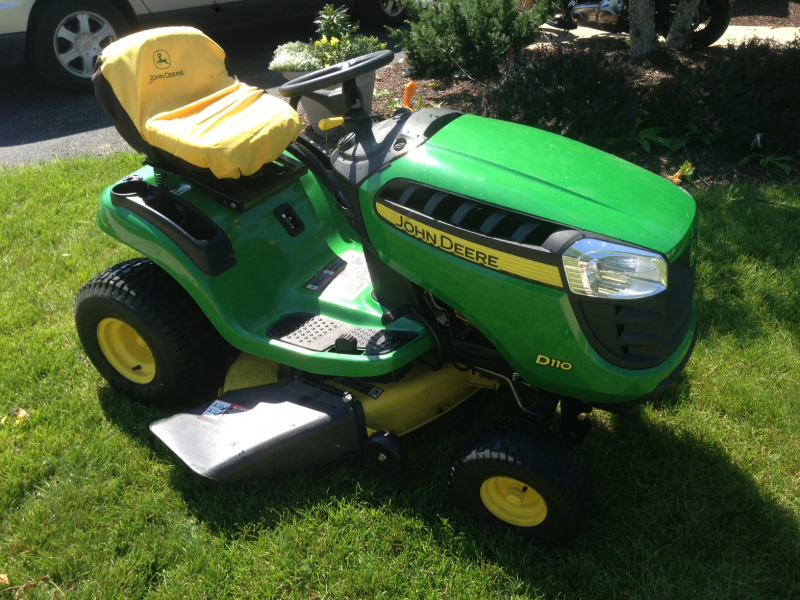 John Deere D110 19.5hp Yard Tractor with Dump Cart and 46" John Deere Snow Blade Plainfield
