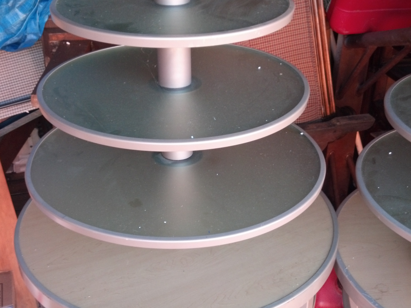 Two Large Round Tiered Retail Display Tables Ex Condition Glass And Metal Two Large Round Tiered Retail Display Tables Ex Condition Glass And Metal