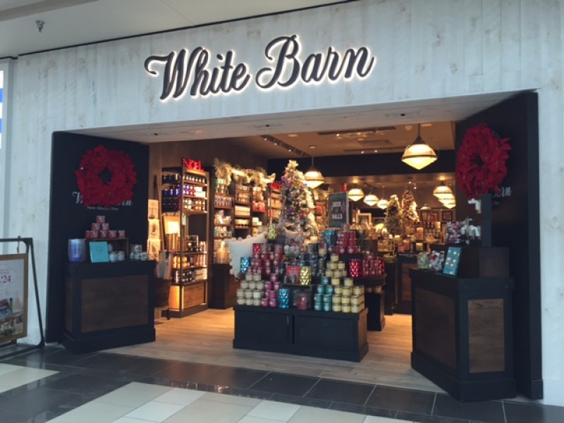 Where can you purchase White Barn Candle Company products?