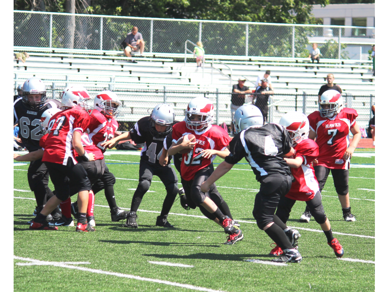 Milford Youth Football 5th Grade Black Team in action against Leicester