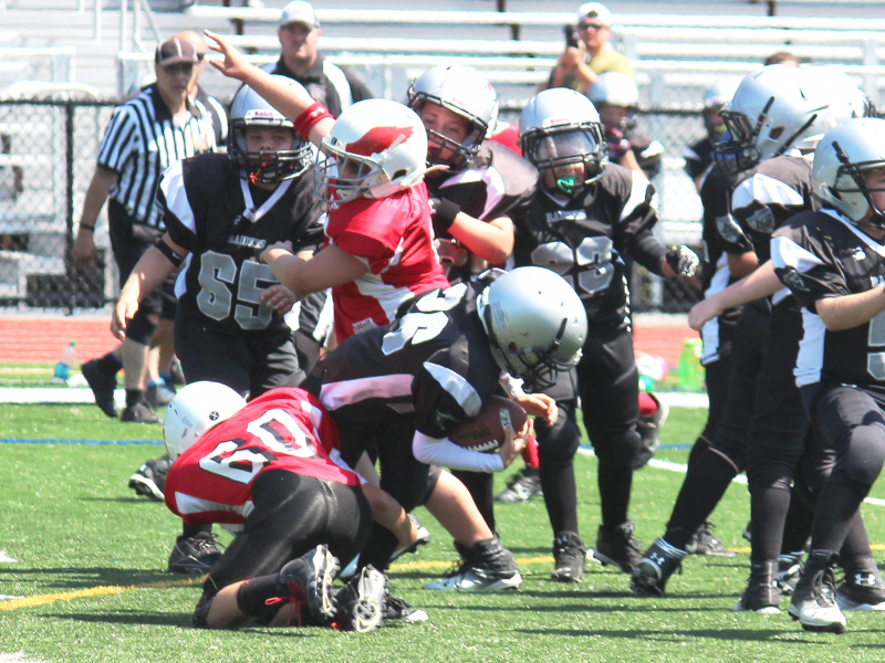 Milford Youth Football 5th Grade Black Team in action against Leicester