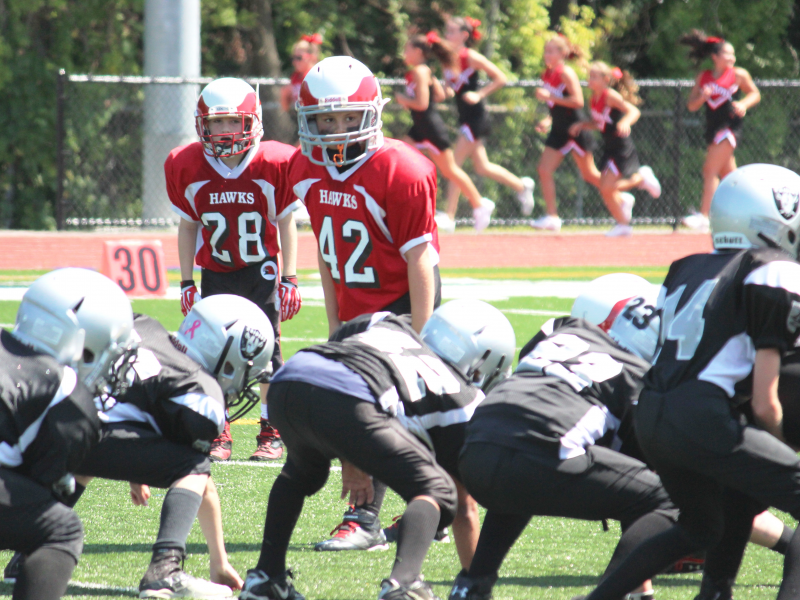 Milford Youth Football 5th Grade Black Team in action against Leicester