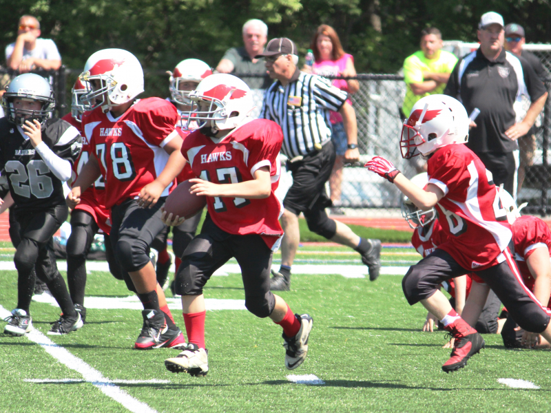 Milford Youth Football 5th Grade Black Team in action against Leicester