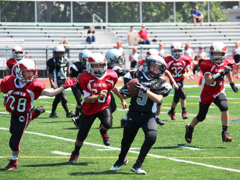 Milford Youth Football 5th Grade Black Team in action against Leicester