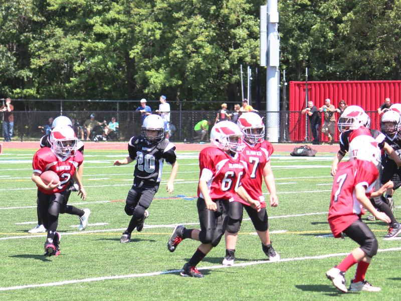 Milford Youth Football 5th Grade Black Team in action against Leicester