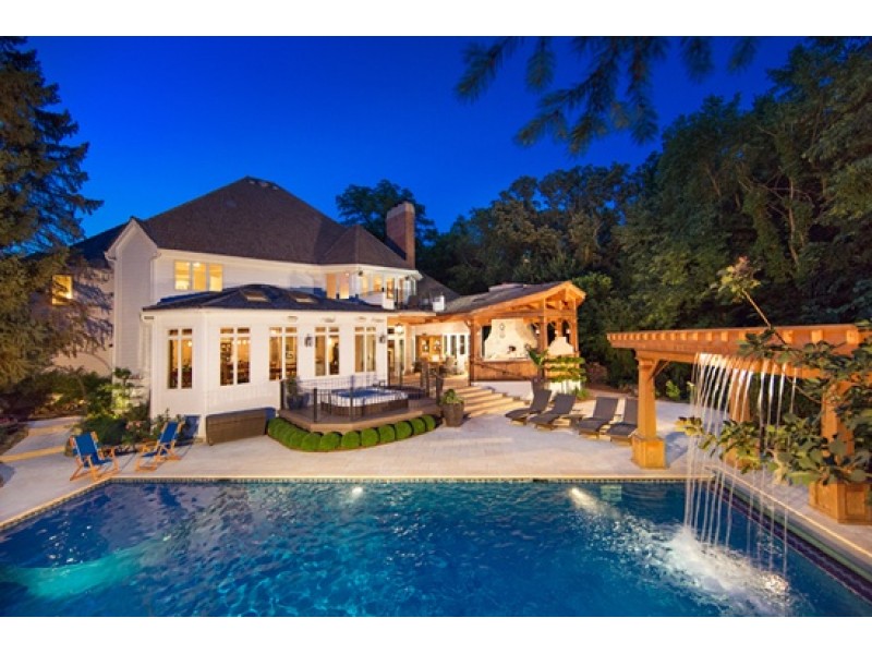 House Wow!: Pool With Waterfall; Heated Outdoor Kitchen; Perennial