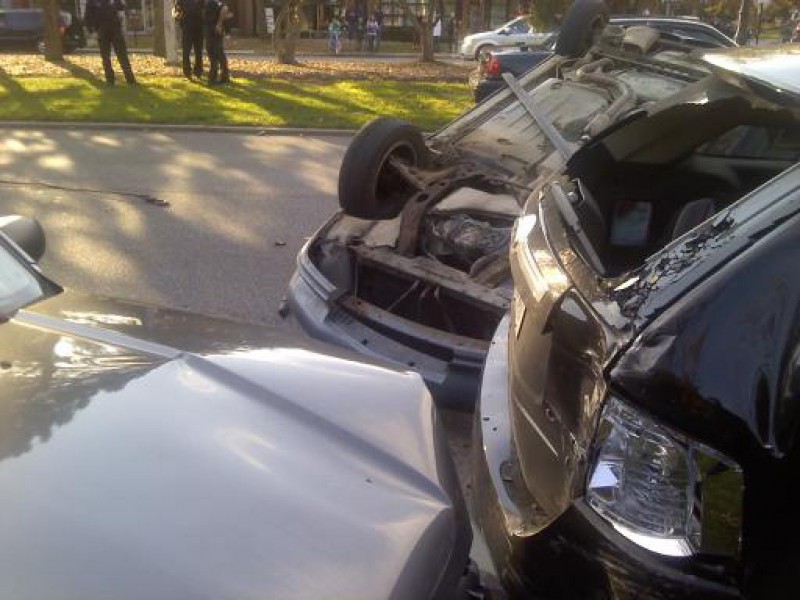 Rollover Crash on Grosse Pointe WoodsFarms Border Injures 2, Damages 3