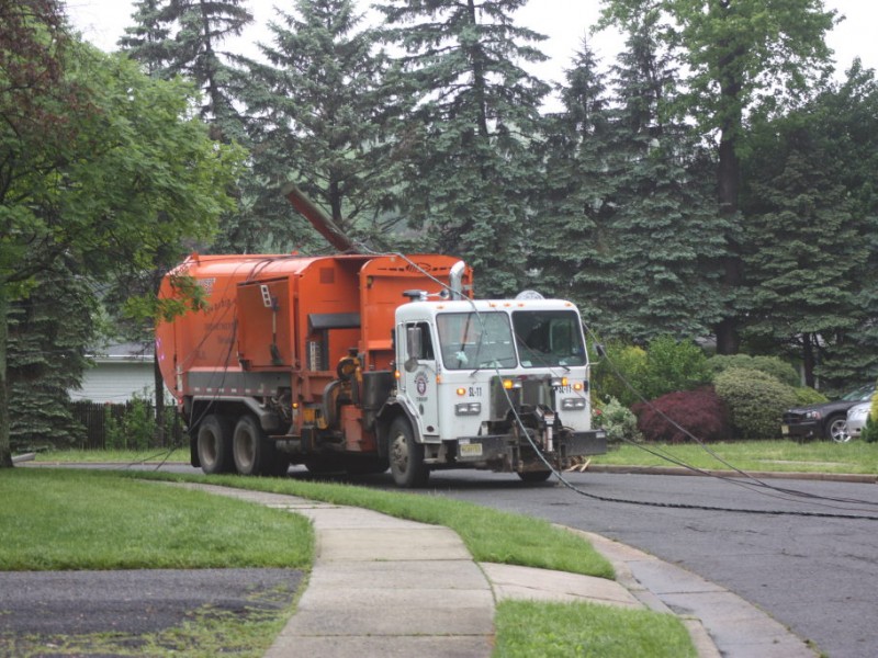 Garbage Truck Hits Low-Hanging Power Lines, Pulling Out Poles ...